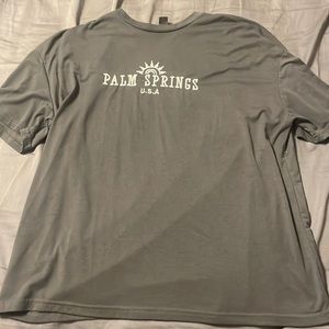 Dark grey oversized and embroidered t-shirt.